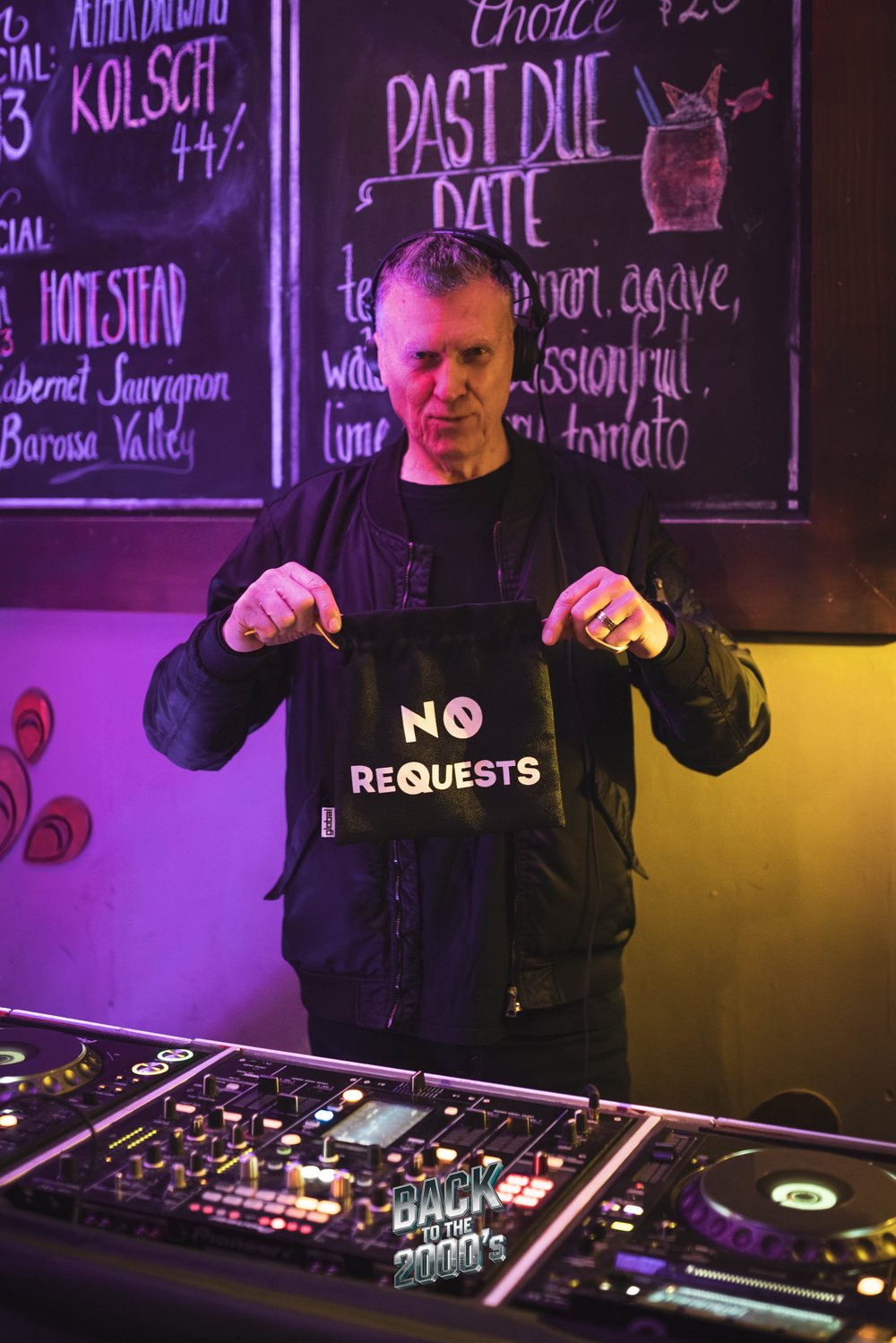 In the DJ booth at Back to the 2000s Melbourne